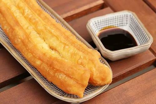 想學(xué)油條技術(shù)？這里的學(xué)費(fèi)讓你意想不到！